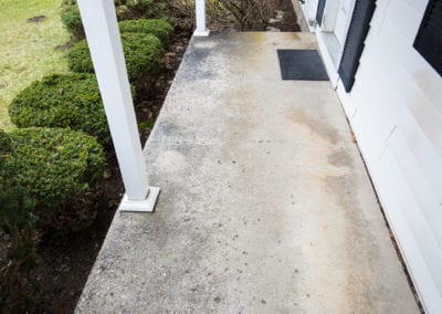 Luber Associates INC, craked and worn cement porch