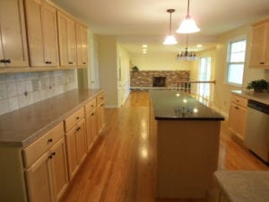 hardwood flooring in a kitchen and dining room