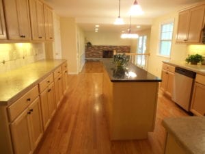 renovated kitchen with hardwood flooring