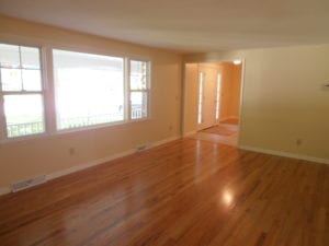 renovated living room with hardwood flooring
