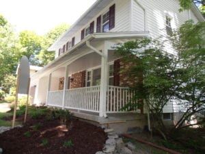 exterior renovation with new porch railing