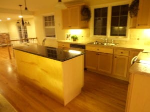 after photos - completed kitchen renovation with stone topped kitchen island